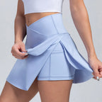 Volupie Court Skort | Falda Deportiva Cintura en V con Short Interior y Bolsillo