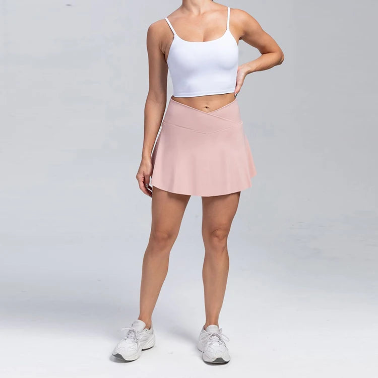 Volupie Court Skort | Falda Deportiva Cintura en V con Short Interior y Bolsillo