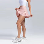 Volupie Court Skort | Falda Deportiva Cintura en V con Short Interior y Bolsillo