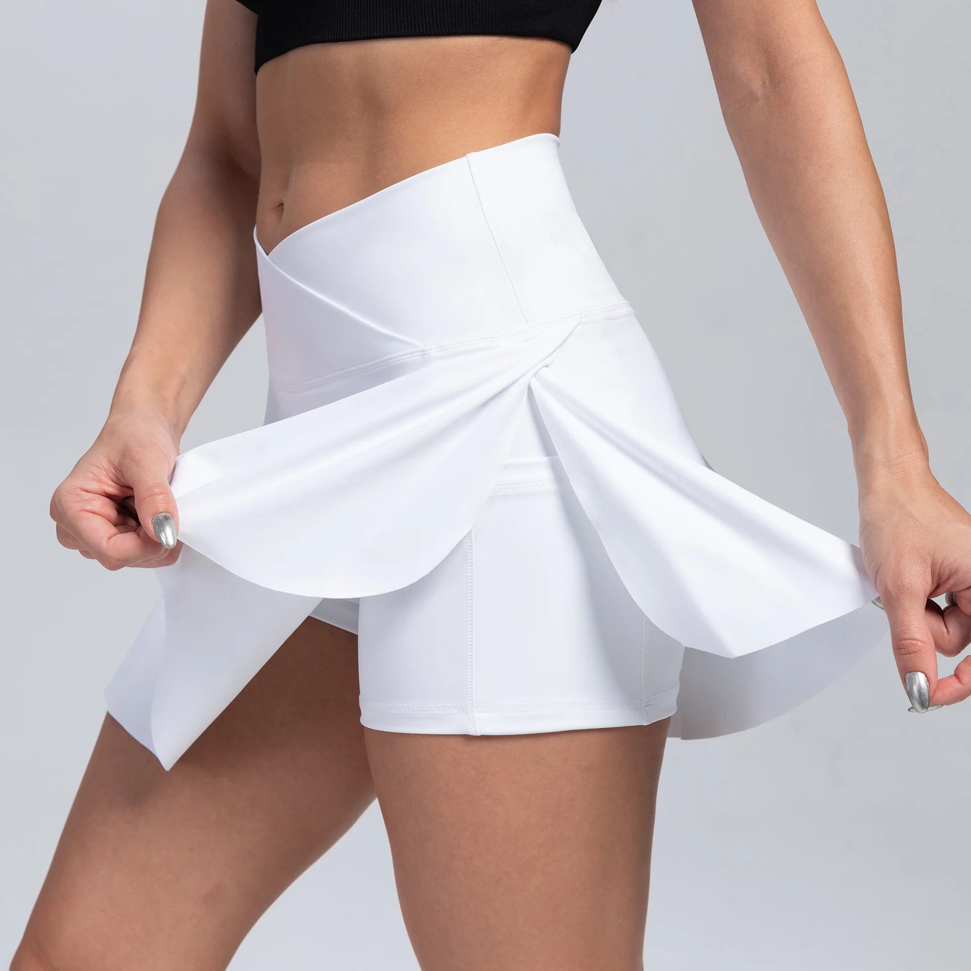 Volupie Court Skort | Falda Deportiva Cintura en V con Short Interior y Bolsillo