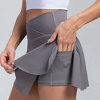 Volupie Court Skort | Falda Deportiva Cintura en V con Short Interior y Bolsillo